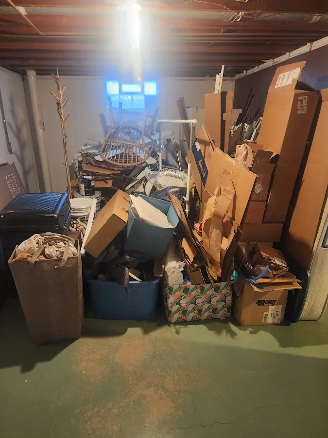 Roll-off dumpster container at job site for Construction Dumpster Rental in Roma